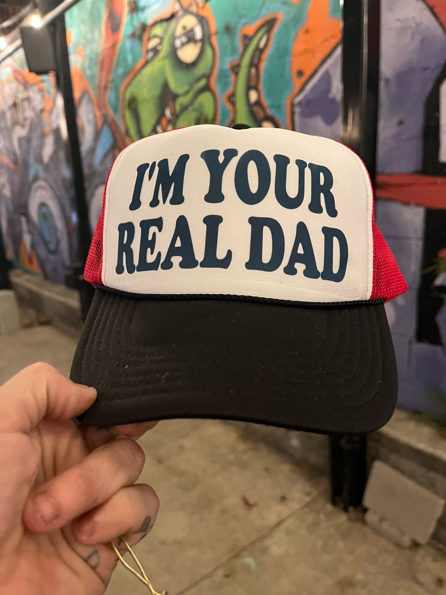 I'M YOUR REAL DAD Trucker Hat