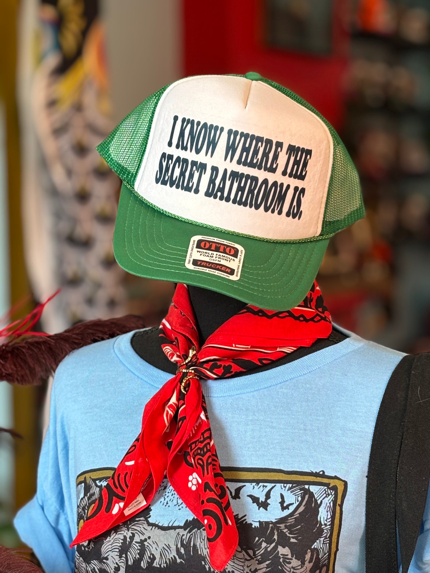I KNOW WHERE THE SECRET BATHROOM IS Trucker Hat