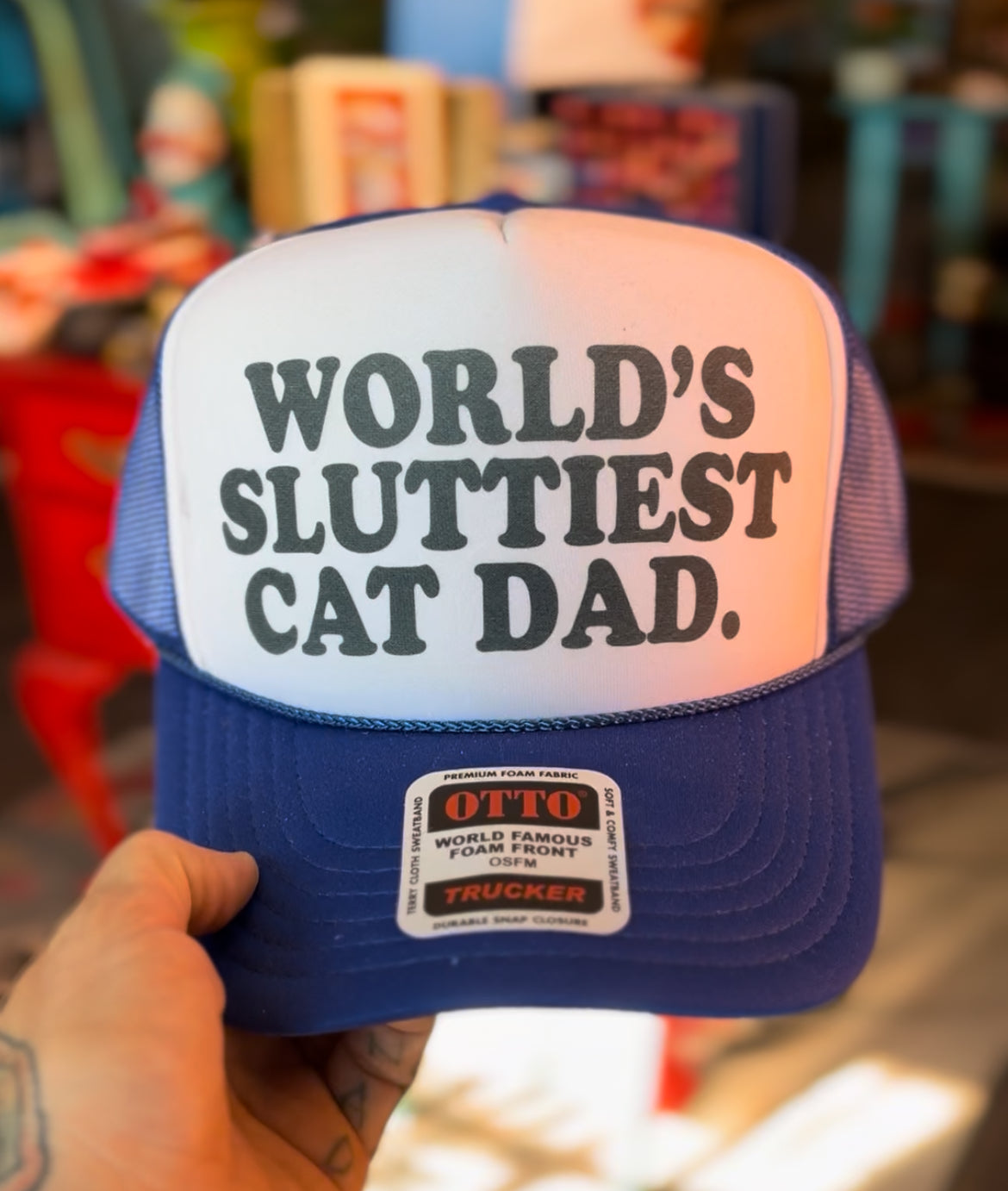 WORLD'S SLUTTIEST CAT DAD Trucker Hat