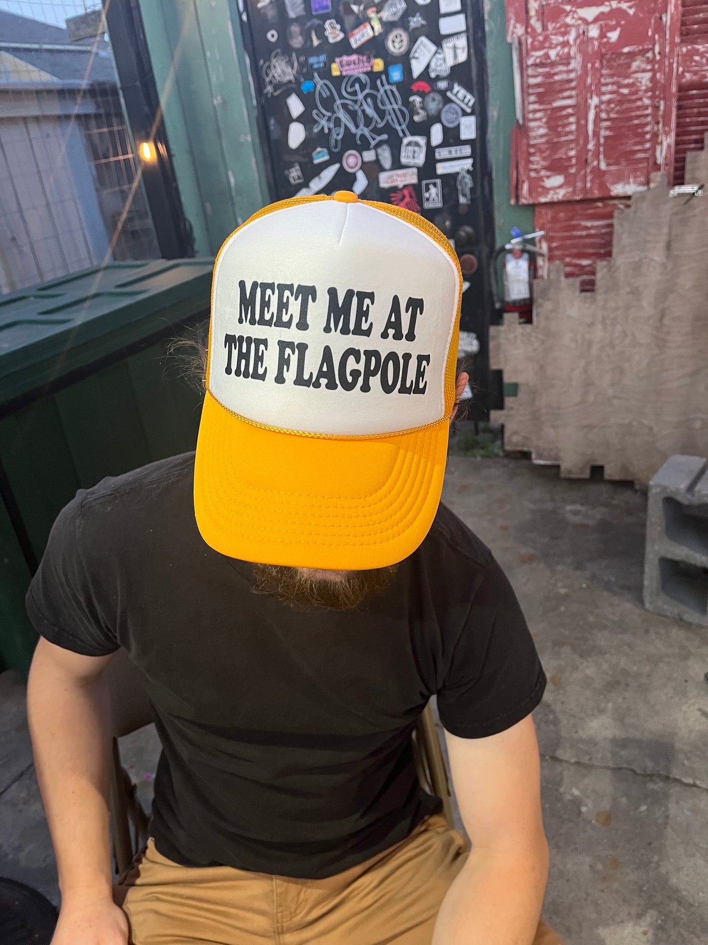 MEET ME AT THE FLAGPOLE Trucker Hat