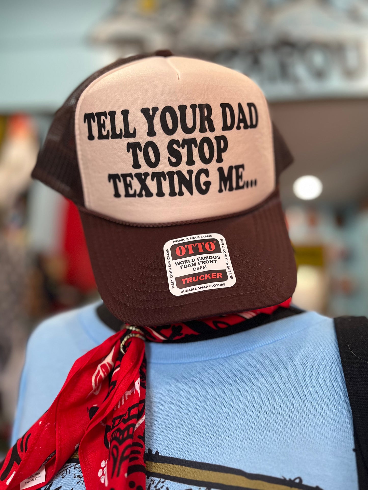TELL YOUR DAD TO STOP TEXTING ME Trucker Hat