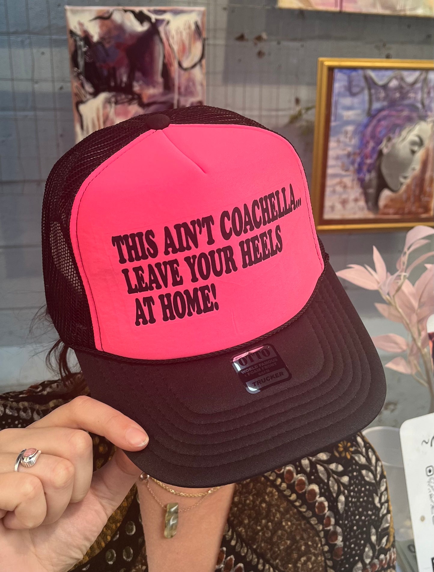 THIS AIN'T COACHELLA LEAVE YOUR HEELS AT HOME Trucker Hat